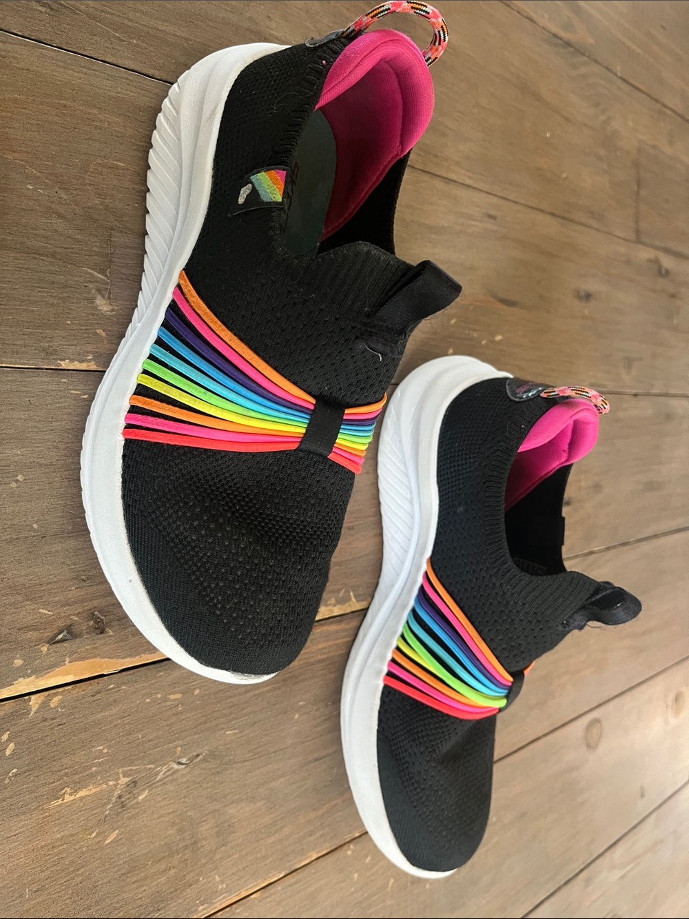 Skechers Kids Black Slip-On Sneakers with Rainbow Straps & Pink Lining